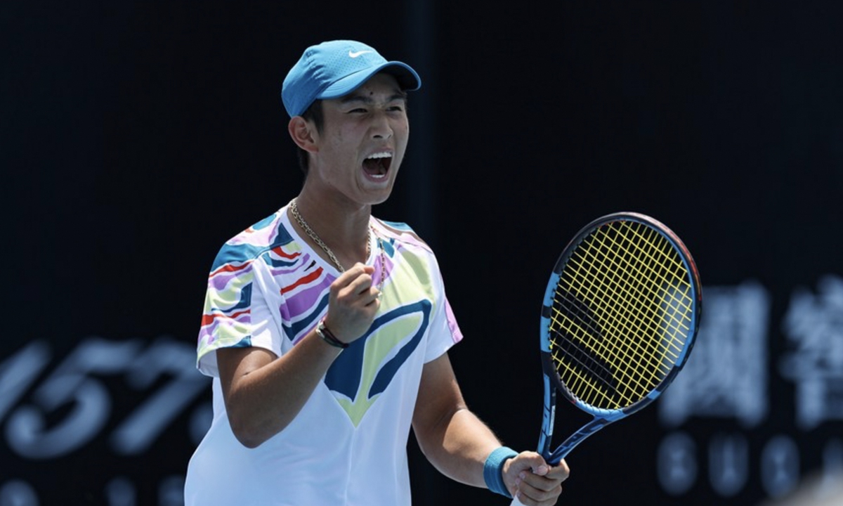 Shang Juncheng of China celebrates after winning the men's single 1st round match against Oscar Otte of Germany at Australian Open tennis tournament, in Melbourne, Australia, on Jan. 16, 2023. Photo: Xinhua/Bai Xuefei