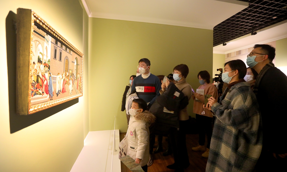 Visitors look at a painting from UK's National Gallery at the Shanghai Museum. Photo: Chen Xia/GT