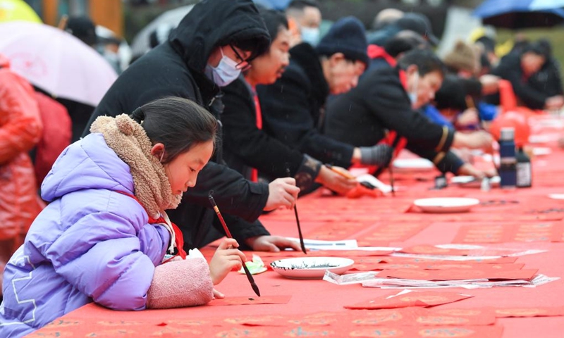 People attend a Spring Festival couplets writing activity in Yongchuan District, southwest China's Chongqing, Jan. 16, 2023.(Photo: Xinhua)