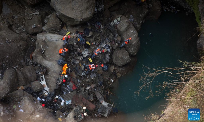 Rescuers work at the crash site of a passenger plane near Pokhara, Nepal, on Jan. 17, 2023. With the second body recovered at the crash site of a Nepali passenger plane in central Nepal on Tuesday, 71 bodies had been found with the last missing victim remains to be confirmed, an official said.(Photo: Xinhua)