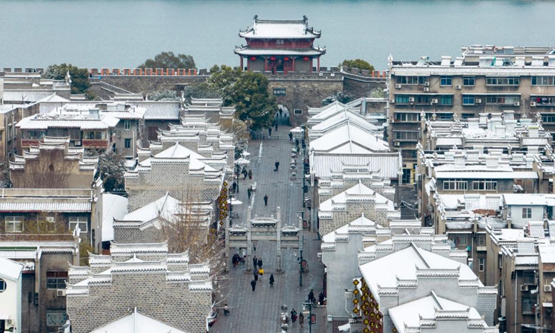 This aerial photo taken on Jan. 15, 2023 shows the snow scenery of the ancient town of Xiangyang City, central China's Hubei Province.(Photo: Xinhua)