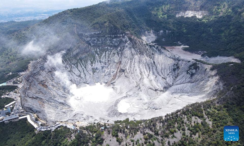 This aerial photo taken on Jan. 22, 2023 shows the crater of Tangkuban Perahu, a volcano near the city of Bandung, Indonesia. The Tangkuban Perahu volcano has attracted many visitors during the Spring Festival holiday in Indonesia. The Chinese Lunar New Year, or Spring Festival, falls on Sunday. (Xinhua/Xu Qin)