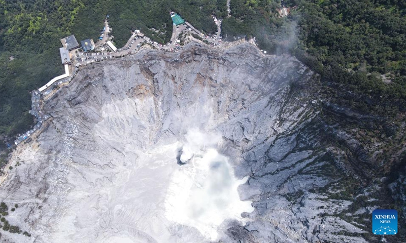 This aerial photo taken on Jan. 22, 2023 shows the crater of Tangkuban Perahu, a volcano near the city of Bandung, Indonesia. The Tangkuban Perahu volcano has attracted many visitors during the Spring Festival holiday in Indonesia. The Chinese Lunar New Year, or Spring Festival, falls on Sunday. (Xinhua/Xu Qin)