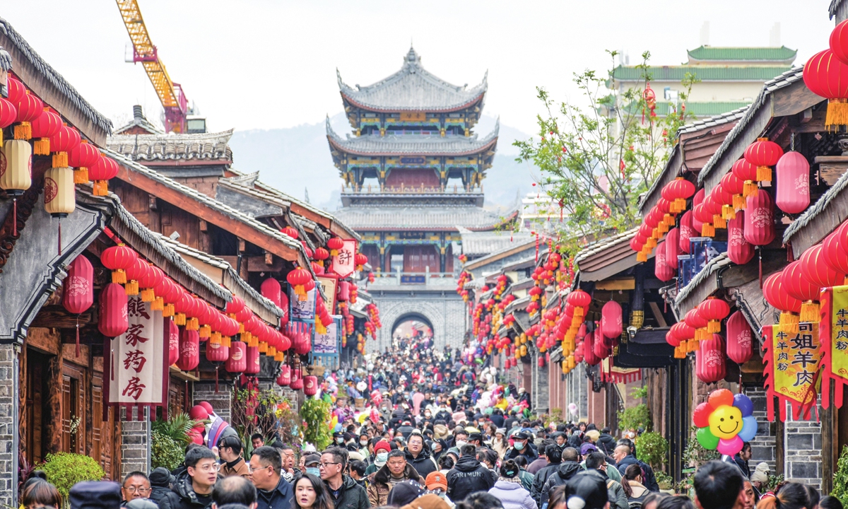 Tourists throng the streets of Xichang,?Liangshan?Yi Autonomous Prefecture, Sichuan Province on January 27, 2023. During the Spring Festival, Xichang received more than 100,000 tourists a day during the peak period. Photo: VCG