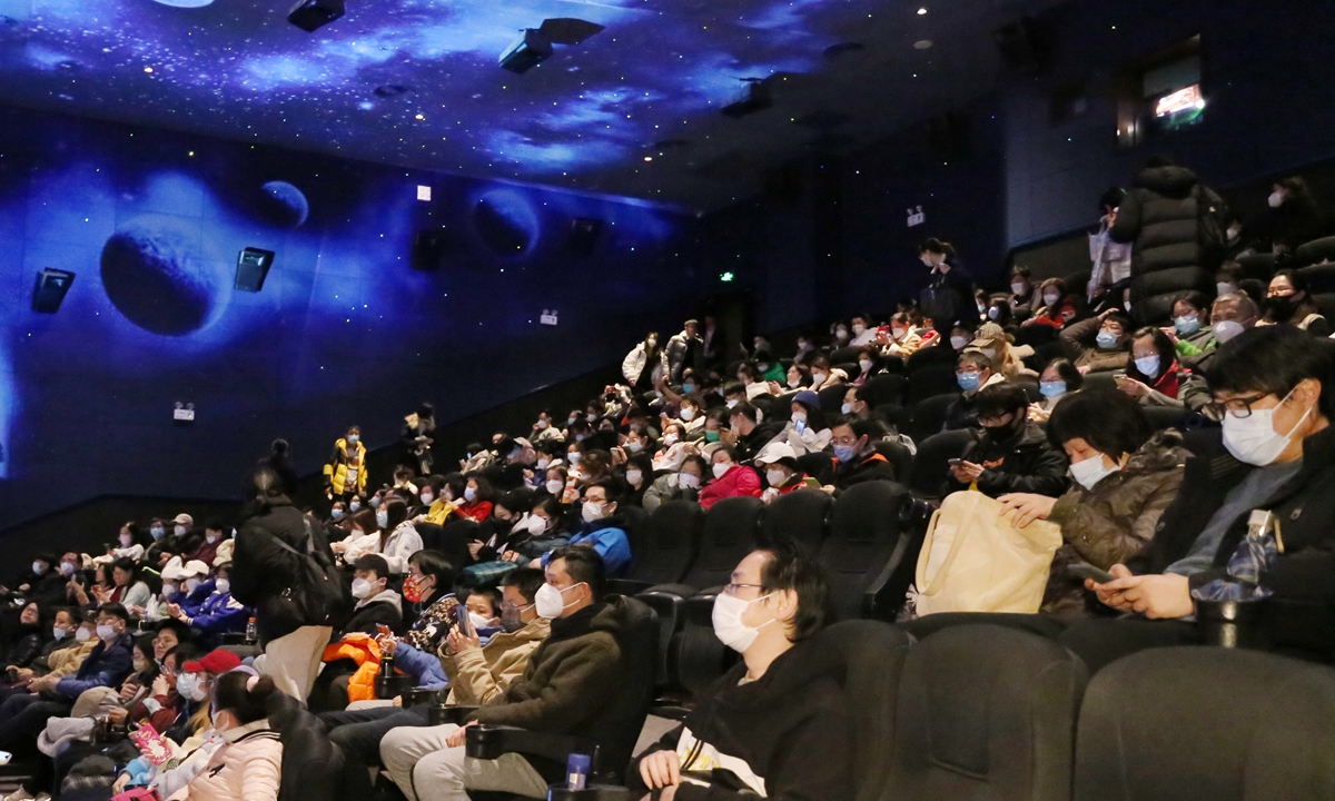 People watch a movie in a Shanghai cinema on January 23, 2023. Photo: IC
