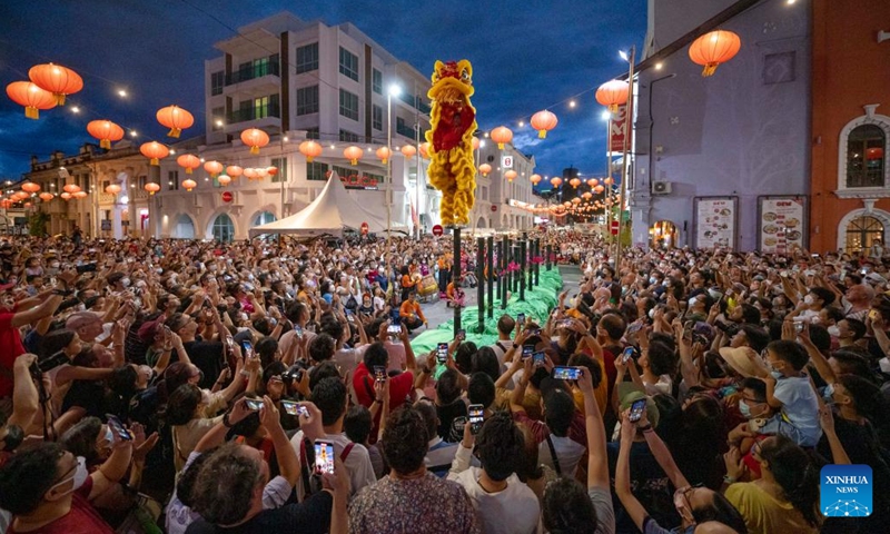 Artists perform lion dance at the Penang Chinese New Year Celebration in George Town, Penang, Malaysia, Jan. 28, 2023. (Photo: Xinhua)