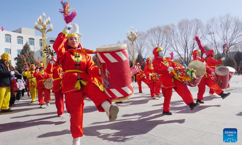 People perform the Taiping Drum dance in celebration of the upcoming Latern Festival in Kazak Autonomous County of Aksay in northwest China's Gansu Province, Jan. 30, 2023. The Lantern Festival, the 15th day of the first month of the Chinese lunar calendar, falls on Feb. 5 this year. The festival features family reunions, feasts, light shows and various cultural activities.(Photo: Xinhua)