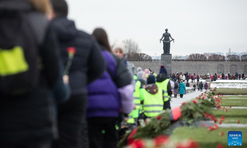 People line up to lay flowers at a memorial activity in St. Petersburg, Russia, Jan. 27, 2023. Activities were held here to mark the 79th anniversary of ending the Nazi siege of Leningrad during World War II. Leningrad, known as St. Petersburg today, was besieged by the Nazi troops on Sept. 8, 1941 and the siege was lifted on Jan. 27, 1944.(Photo: Xinhua)