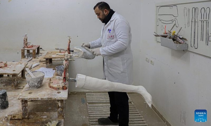 A medical worker prepares an artificial limb at Gaza's Artificial Limbs and Polio Center (ALPC) in Gaza City, on Jan. 29, 2023.(Photo: Xinhua)