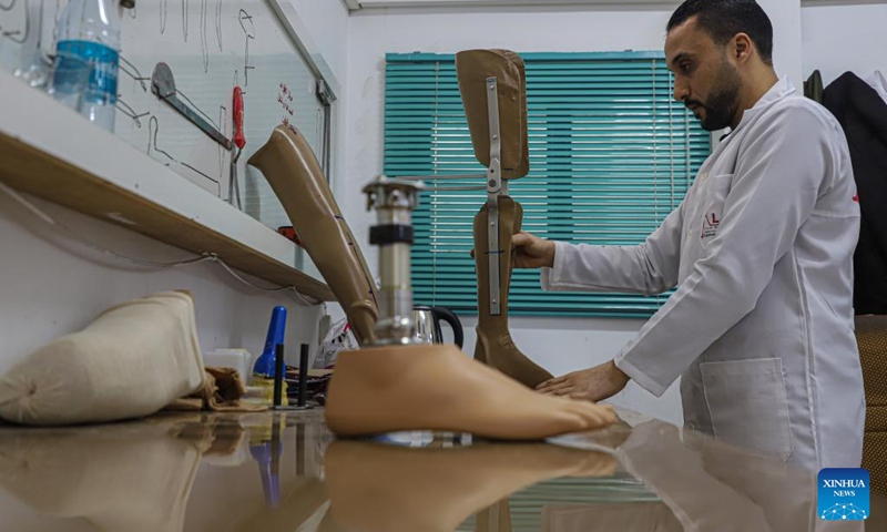 A medical worker prepares an artificial limb at Gaza's Artificial Limbs and Polio Center (ALPC) in Gaza City, on Jan. 29, 2023.(Photo: Xinhua)
