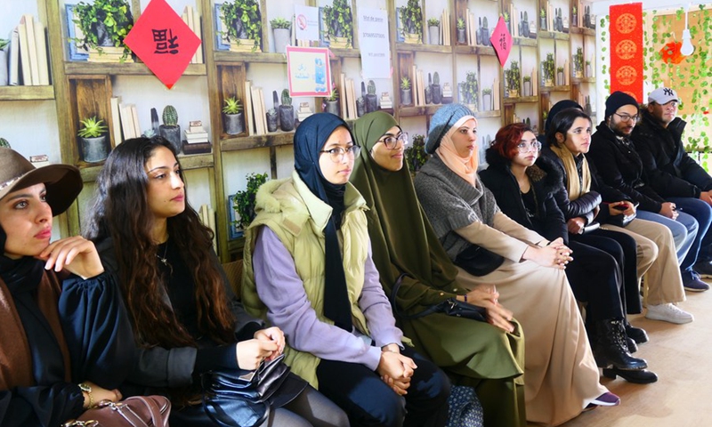 Some Tunisian students participated in activities about the Chinese New Year in the Oriental Knowledge Bookstore in Tunis, Tunisia on Jan. 27, 2023. (Photo: Xinhua)