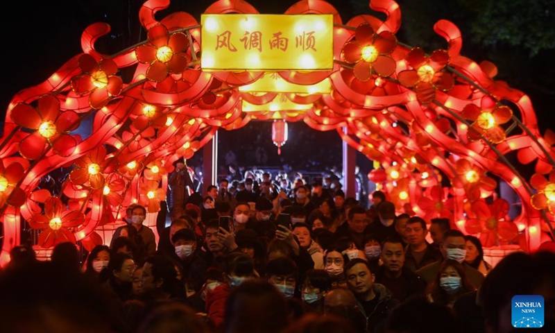 Tourists view lanterns at Aoshan Lantern Festival in Xincheng ancient town of Xiuzhou District in Jiaxing, east China's Zhejiang Province, Jan. 29, 2023. The Aoshan Lantern Festival, which has a history of hundreds of years, kicked off here on Sunday.(Photo: Xinhua)