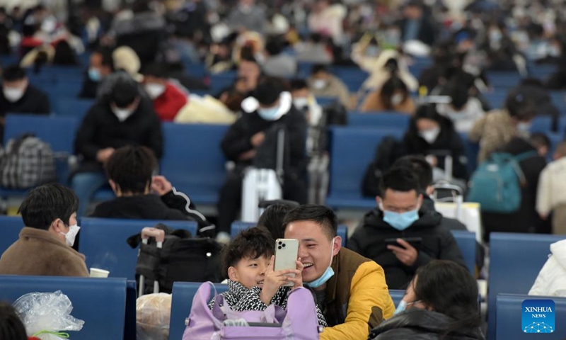 Passengers wait at Fuyang West Railway Station in Fuyang City, east China's Anhui Province, Jan. 27, 2023. Fuyang West Railway Station was bustling with passengers on Friday, the last day of the Spring Festival holiday. As more railway stations have been put into use in the city, more people choose to travel by high-speed train to go to work or visit families. The city has seen a sharp increase in the number of railway passengers.(Photo: Xinhua)
