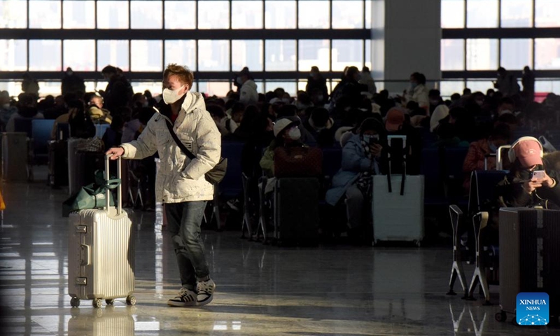 Passengers wait at Fuyang West Railway Station in Fuyang City, east China's Anhui Province, Jan. 27, 2023. Fuyang West Railway Station was bustling with passengers on Friday, the last day of the Spring Festival holiday. As more railway stations have been put into use in the city, more people choose to travel by high-speed train to go to work or visit families. The city has seen a sharp increase in the number of railway passengers.(Photo: Xinhua)