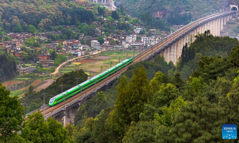 An Fuxing bullet train runs on the China's section of the China-Laos Railway on Jan. 27, 2023. As of Tuesday, the China-Laos Railway had operated 20,000 passenger trains and handled 10.3 million passenger trips since its launch in December 2021, the railway operator said Wednesday.((Photo: Xinhua)