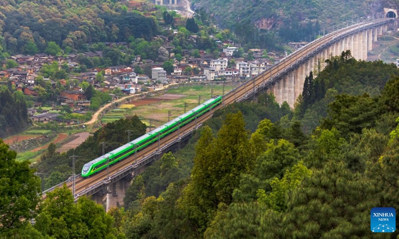 An Fuxing bullet train runs on the China's section of the China-Laos Railway. (Photo: Xinhua)