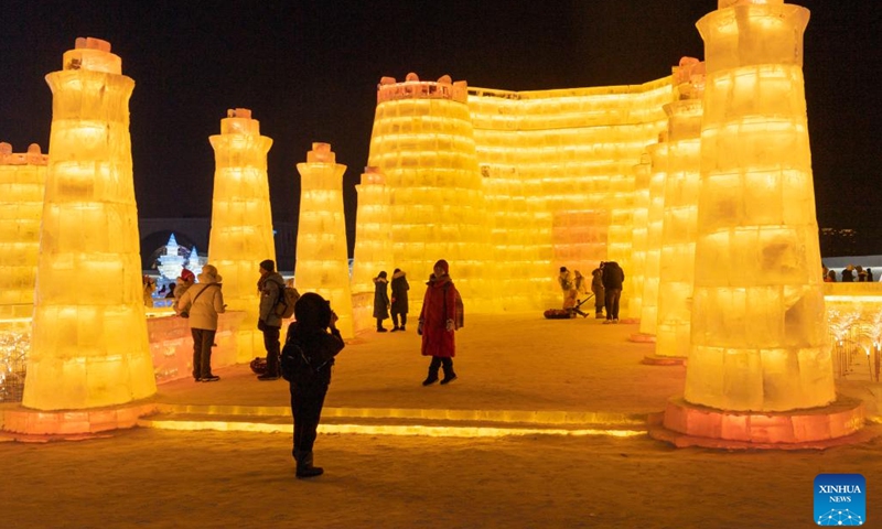 People visit the Ice-Snow World theme park in Harbin, northeast China's Heilongjiang Province, Feb. 1, 2023. Harbin, known as China's ice city, has been attracting many tourists in winter tourism season.(Photo: Xinhua)