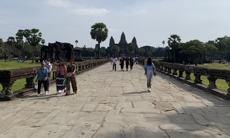Tourists visit the Angkor Wat in the Angkor Archaeological Park in Siem Reap province, Cambodia, Dec. 17, 2022.(Photo: Xinhua)