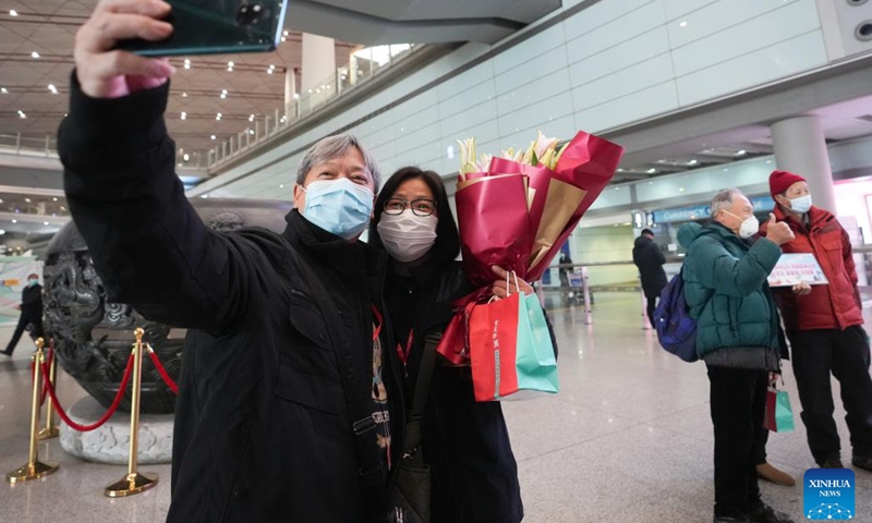 Tourists of the first tour group from Hong Kong take a selfie at Beijing Capital International Airport in Beijing, capital of China, Feb. 6, 2023. The Chinese mainland fully resumed normal travel with the Hong Kong and Macao special administrative regions (SARs) starting Monday, in what is expected to be a strong boost for the two regions' economic development.(Photo: Xinhua)