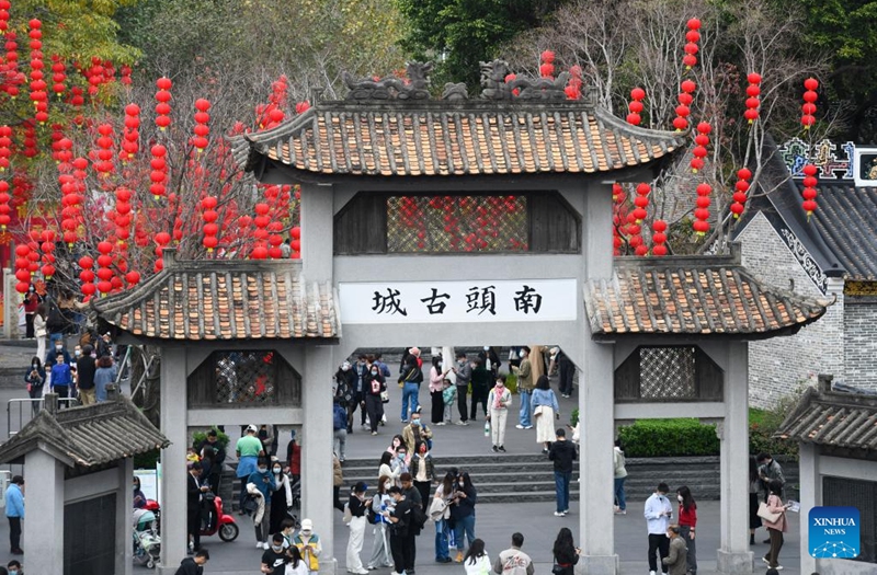 Tourists visit Nantou ancient town in Shenzhen, south China's Guangdong Province, on Feb. 4, 2023. A fair was held in Nantou ancient town to celebrate the upcoming Lantern Festival, which falls on Feb. 5 this year. (Xinhua/Liang Xu)