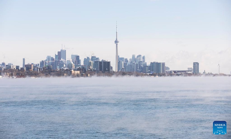 This photo taken on Feb. 3, 2023 shows the Lake Ontario with steam fog in Toronto, Canada. Environment Canada has issued an extreme cold warning for Toronto on Friday. (Photo by Zou Zheng/Xinhua)