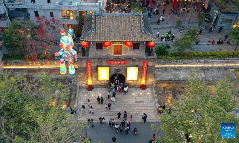 This aerial photo taken on Feb. 4, 2023 shows Nantou ancient town in Shenzhen, south China's Guangdong Province. A fair was held in Nantou ancient town to celebrate the upcoming Lantern Festival, which falls on Feb. 5 this year. (Xinhua/Liang Xu)
