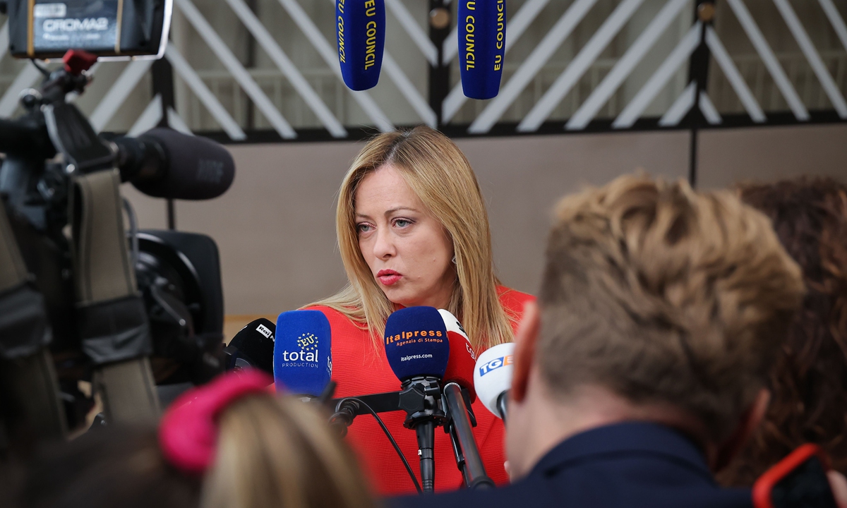 Italian Prime Minister Giorgia Meloni arrives for a summit at EU parliament in Brussels, on February 9, 2023. Meloni told press that French President Emmanuel Macron's decision to invite Ukranian President Volodymyr Zelensky was inappropriate as it undermines European unity. After visiting London and Paris, Zelensky arrived in Brussels on February 9 to push EU leaders for more weapons in the fight against Russia's invasion and also for a quick start to EU membership talks. Photo: VCG