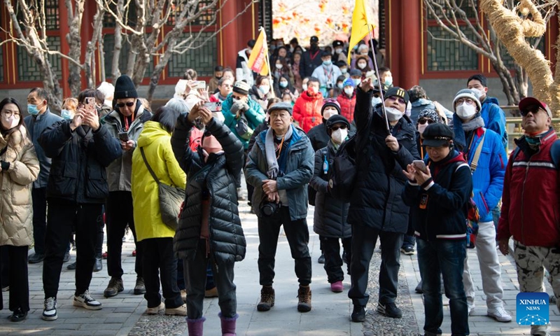 Elderly tourists from Hong Kong visit the Summer Palace in Beijing, capital of China, Feb. 7, 2023. With an average age of over 65, a group of elderly tourists from Hong Kong arrived in Beijing on Monday, becoming the first Hong Kong tour group to Beijing after lifting of restrictions on travel between the Chinese mainland and Hong Kong and Macao special administrative regions (SARs).(Photo: Xinhua)