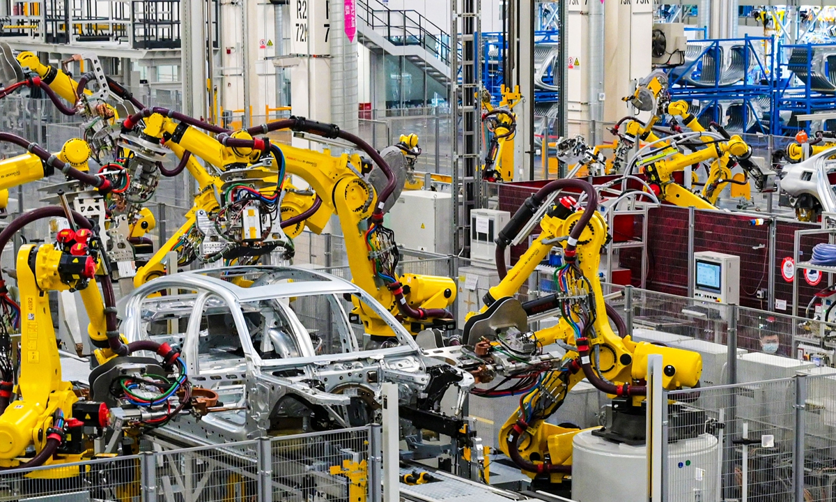 Robots are busy assembling cars at BMW's iFACTORY in Shenyang, Northeast China's Liaoning Province, on February 6, 2023. International auto giants are increasing investment and expanding foothold in China, the world largest auto market. Photo: VCG