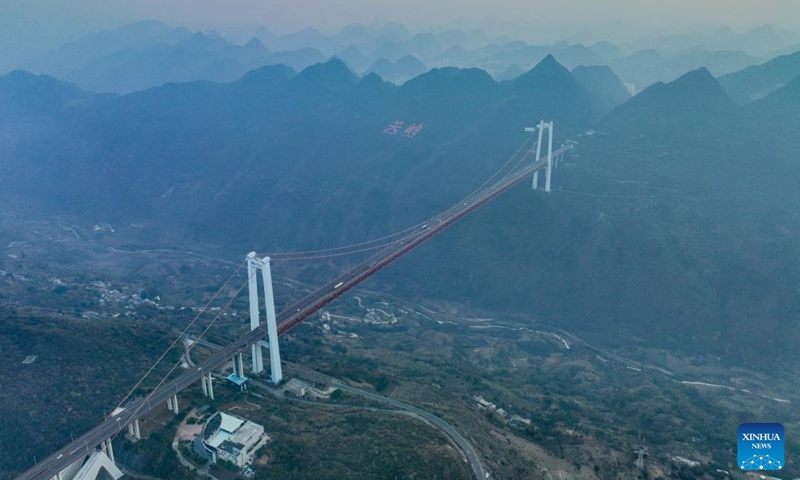This aerial photo taken on Feb. 1, 2023 shows the Baling River bridge in southwest China's Guizhou Province. Guizhou has nearly half of the 100 tallest bridges in the world. Due to the large number of bridges, their types and complex technologies used in the construction of the bridges, the province is known as the museum of world bridges.(Photo: Xinhua)