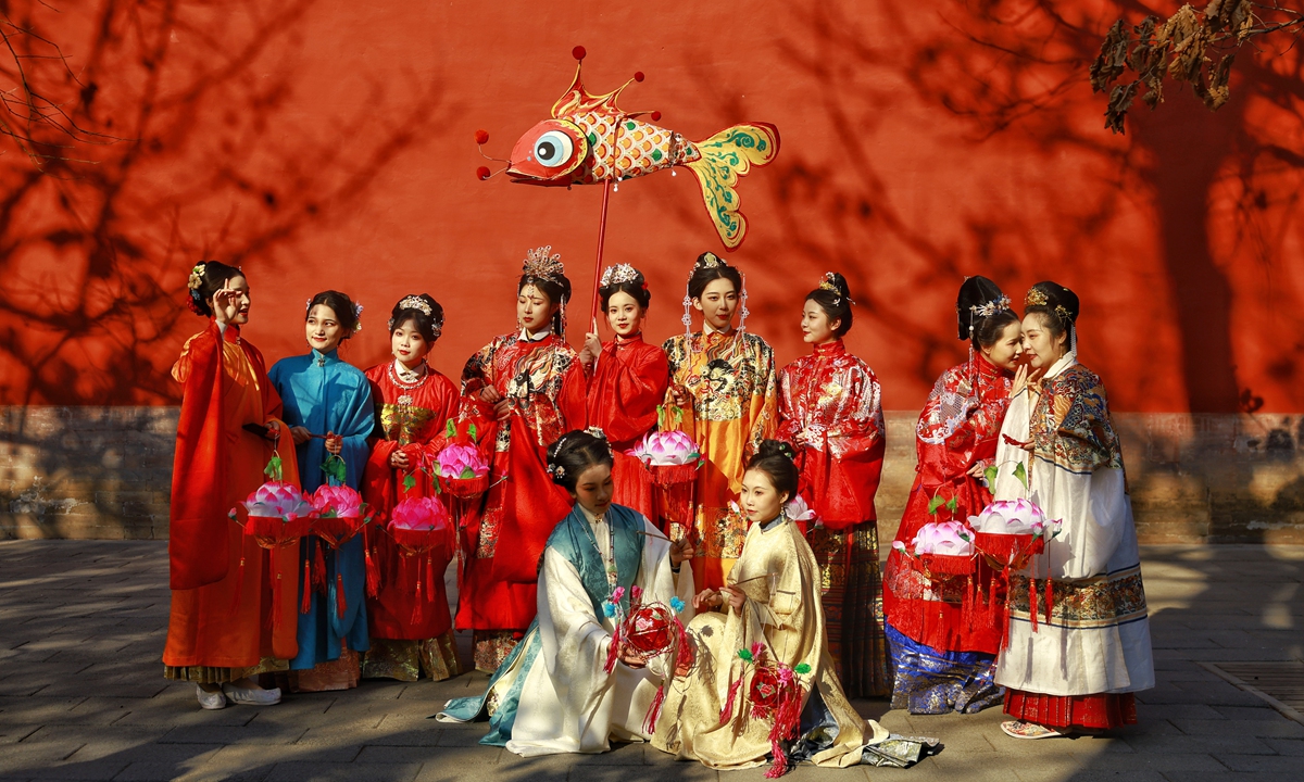 <em>Hanfu</em> lovers celebrate the Lantern Festival at the Ming Tombs in Beijing. 