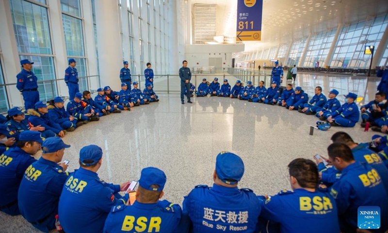 Rescue workers from Blue Sky Rescue (BSR) prepare to depart from the Wuhan Tianhe International Airport in Wuhan, central China's Hubei Province, Feb. 8, 2023, for quake-hit Türkiye to help search and rescue efforts. A total of 127 BSR rescuers left for Türkiye on Wednesday to join earthquake relief efforts in the country.(Photo: Xinhua)