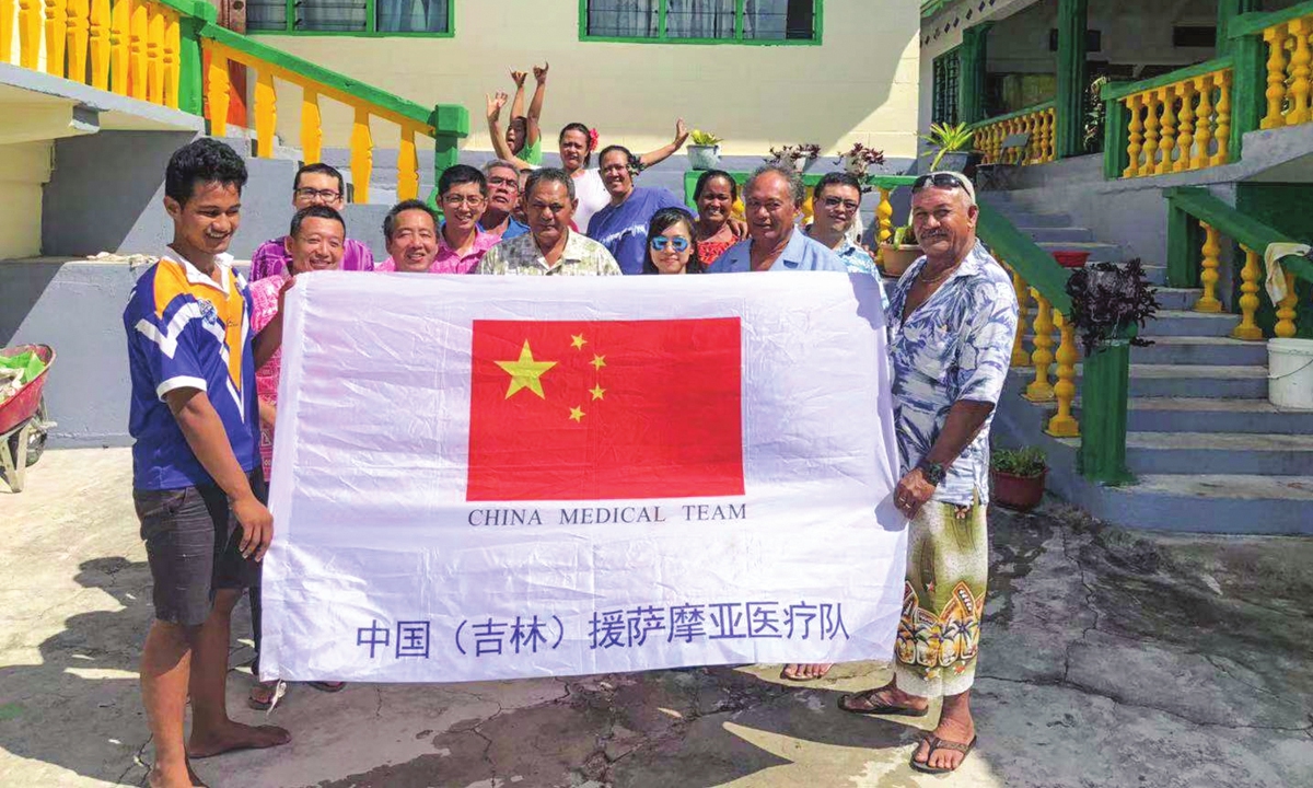 A group photo of the second Chinese medical team dispatched to Samoa during a voluntary clinical treatment camp in Manono Island. Photo: Courtesy of Zhang Jichang