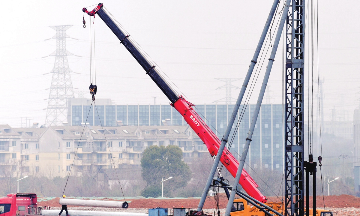 Staffers work at a construction site in Tongling, East China's Anhui Province on February 8, 2023. Major projects across the country resumed construction after China wrapped up celebrations for the Spring Festival holidays. Photo: cnsphoto 