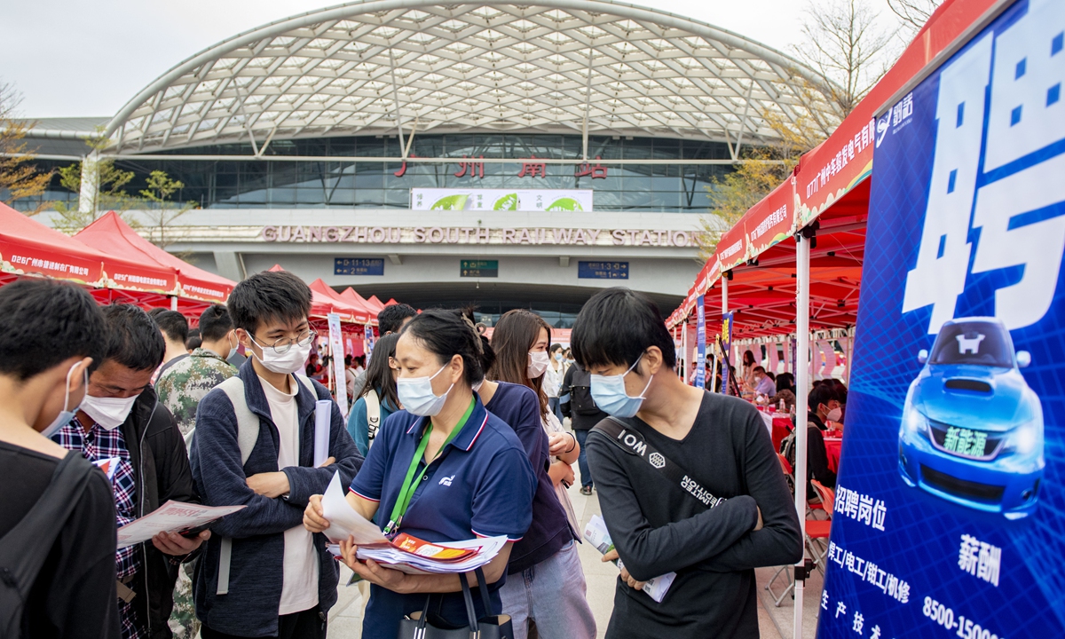 Job-seekers attend a large-scale job fair in Guangzhou, capital of South China's Guangdong Province on February 13, 2023. The local government will organize more than 200 high-quality job fairs in February, as factories face a dire need for skilled workers to ramp up production after the Spring Festival holidays. Photo: VCG
