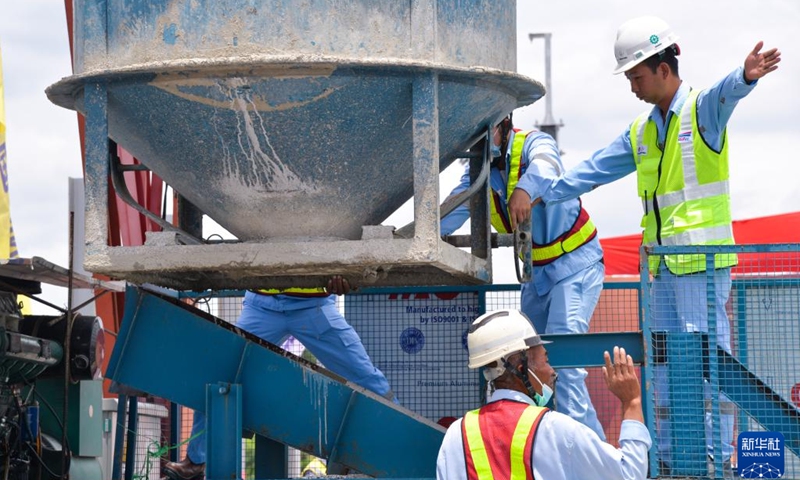 Employees work at the construction site of the last ballastless track slab of Jakarta-Bandung High-Speed Railway in Karawang, West Java, Indonesia, Feb. 15, 2023. With the self-compacting concrete being poured into the last track slab on Wednesday, the construction of ballastless track slabs along the whole line of Jakarta-Bandung High-Speed Railway was completed. At present, all of the subgrade, bridge and station civil works have been completed. The railway is scheduled to start operation mid-year.(Photo: Xinhua)
