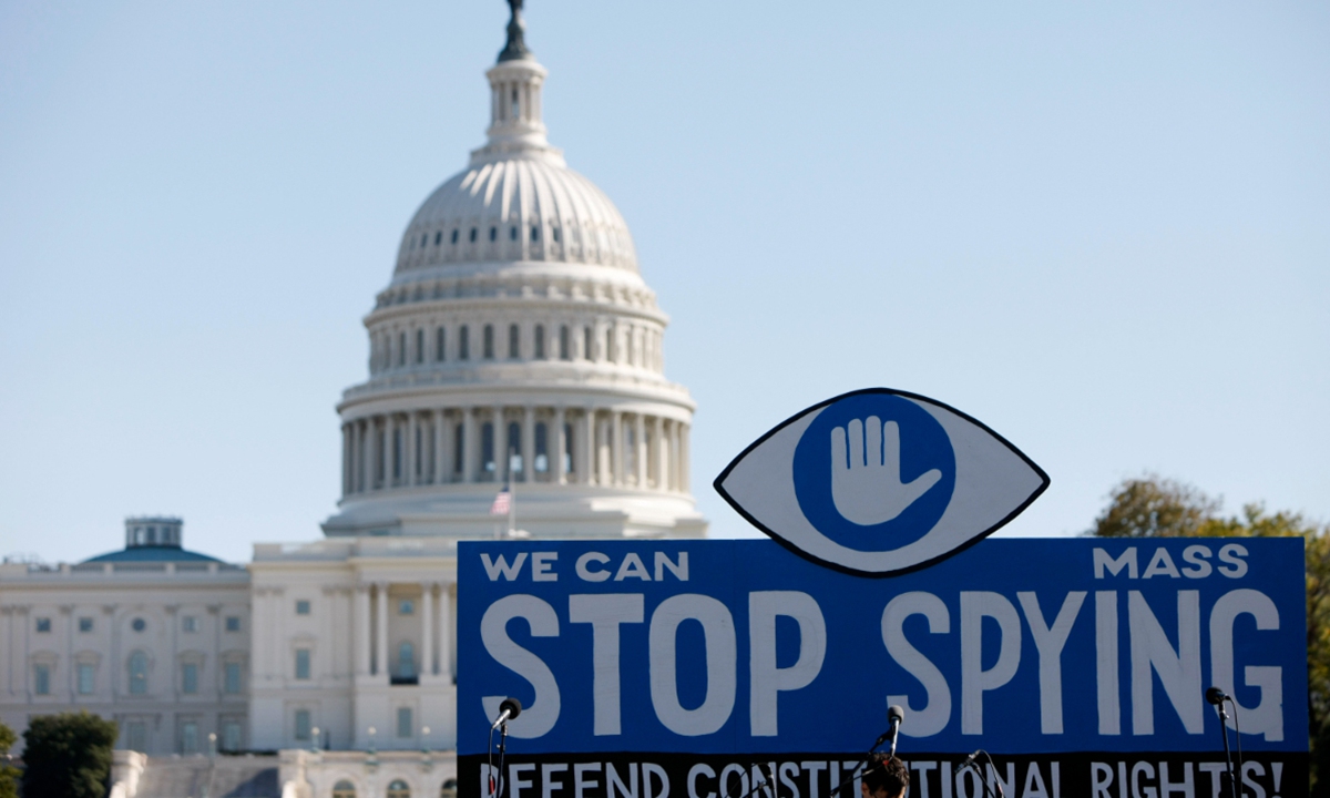 A huge slogan board stands in front of the US Capitol building during a protest against government surveillance in Washington DC, capital of the United Sates, on Oct 26, 2013. Photo:Xinhua