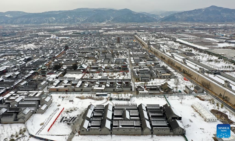 This aerial photo taken on Feb. 13, 2023 shows the snow scenery of the tourist attraction Taiyuan ancient county in Taiyuan, capital of north China's Shanxi Province.(Photo: Xinhua)