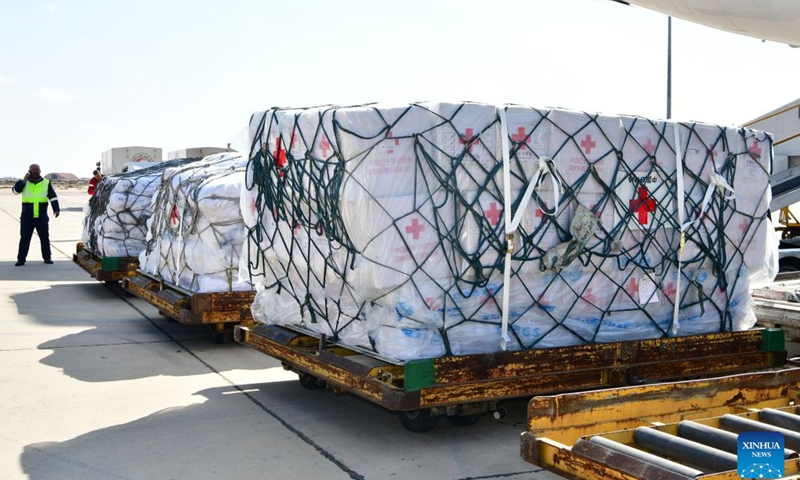 Relief aid from China is unloaded at Damascus international airport in Damascus, Syria, on Feb. 13, 2023. A second batch of relief aid from the Red Cross Society of China (RCSC) arrived in Syria by plane on Monday to provide emergency supplies for people affected by the earthquakes in the country.(Photo: Xinhua)