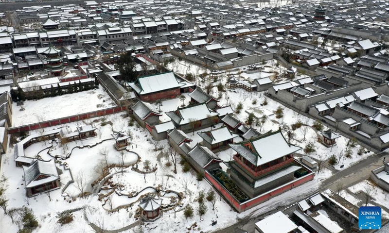 This aerial photo taken on Feb. 13, 2023 shows the snow scenery of the tourist attraction Taiyuan ancient county in Taiyuan, capital of north China's Shanxi Province.(Photo: Xinhua)