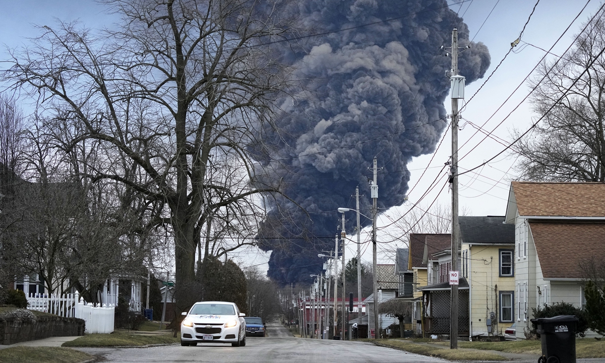 A black plume rises over East Palestine, Ohio, as a result of a controlled detonation of a portion of the derailed Norfolk and Southern trains Monday, Feb. 6, 2023.Photo: VCG