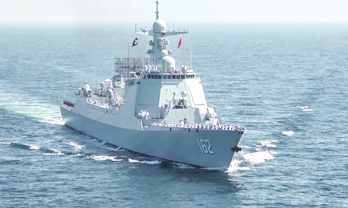 The PLA Navy guided missile destroyer <em>Nanning</em> sets sail during the international fleet review of the AMAN-23 multinational maritime exercise in North Arabian Sea on February 14, 2023. Photo: Courtesy of Cui Ru