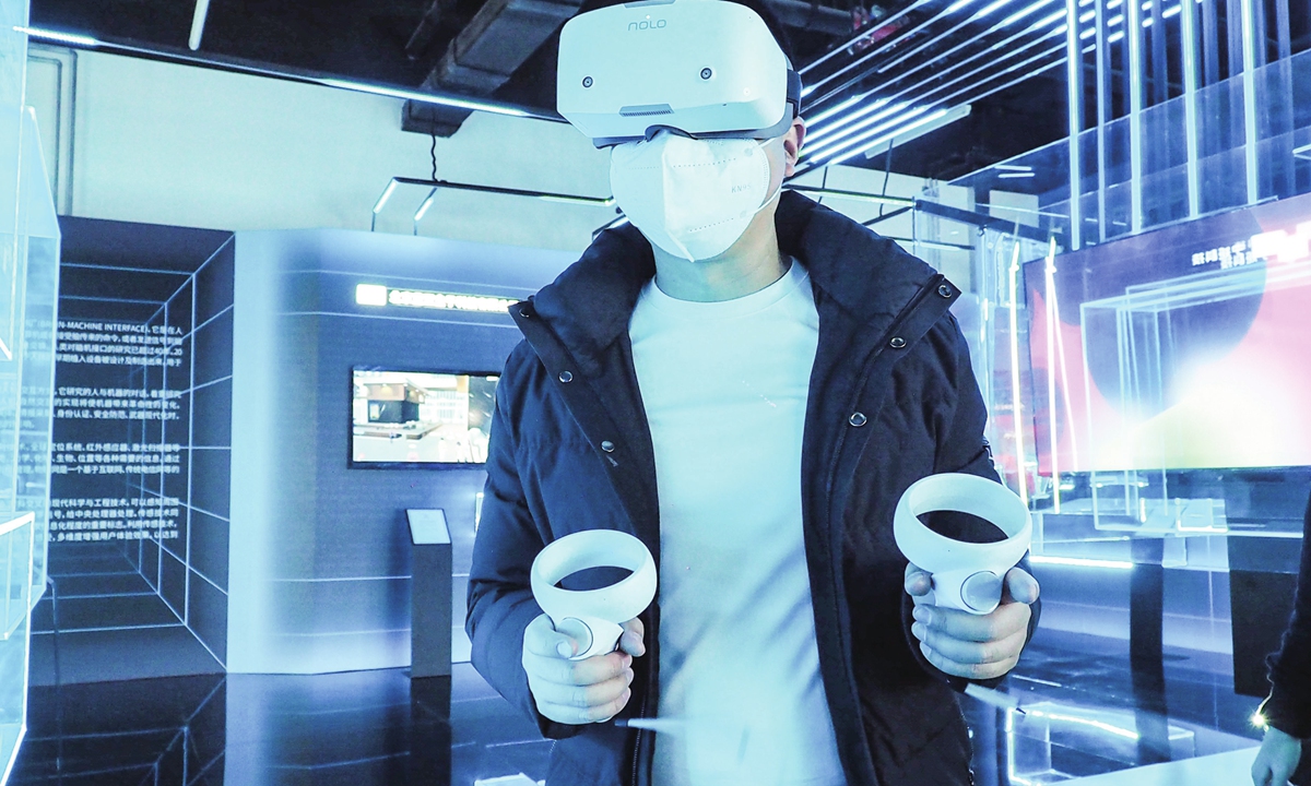 A visitor plays a virtual reality (VR) game at an innovation center in Beijing on February 16, 2023. China's VR industry is attracting huge investment and financing as market players race to tap the burgeoning high-tech sector. Photo: VCG
