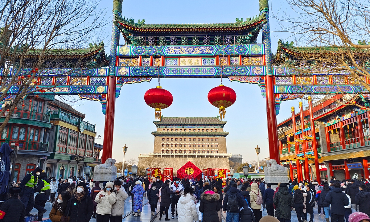 People enjoy the Spring Festival at Qianmen Street in Beijing on January 27, 2023. Photo: IC