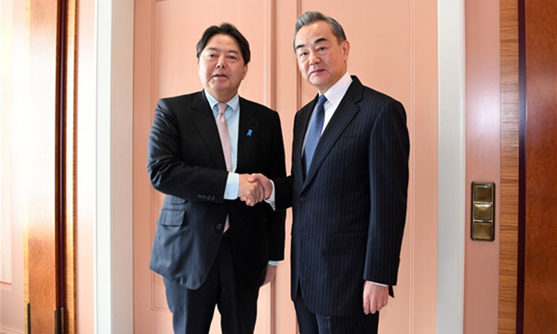 Wang Yi meets with Japanese Foreign Minister Yoshimasa Hayashi during the Munich Security Conference on February 18, 2023. Photo: Chinese Foreign Ministry