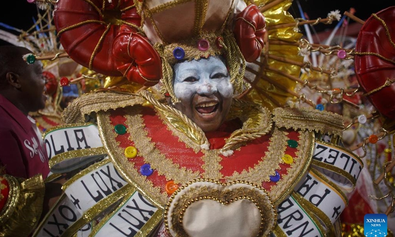 A reveler participates in the carnival parade at the Sambadrome in Rio de Janeiro, Brazil, on Feb. 19, 2023. The Brazilian city's carnival is the South American country's biggest popular festival and one of the largest carnival celebrations in the world.(Photo: Xinhua)