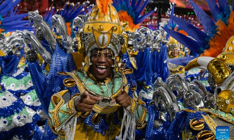 A reveler participates in the carnival parade at the Sambadrome in Rio de Janeiro, Brazil, on Feb. 19, 2023. The Brazilian city's carnival is the South American country's biggest popular festival and one of the largest carnival celebrations in the world.(Photo: Xinhua)