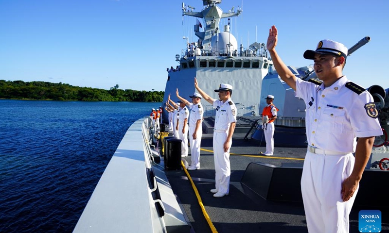 Officers and soldiers of the 42nd Chinese naval escort fleet wave to the crowd at the Port of Richards Bay, South Africa, Feb. 19, 2023.(Photo: Xinhua)