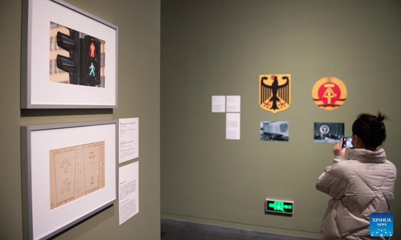 Visitors view the Crossing Parallels: German Design 1945-1990 exhibition in Tsinghua University Art Museum in Beijing, capital of China, Feb. 21, 2023. The exhibition presents over 300 pieces of German design work covering graphic design, furniture design, industrial design, lighting design, interior design, fashion and many other categories.(Photo: Xinhua)