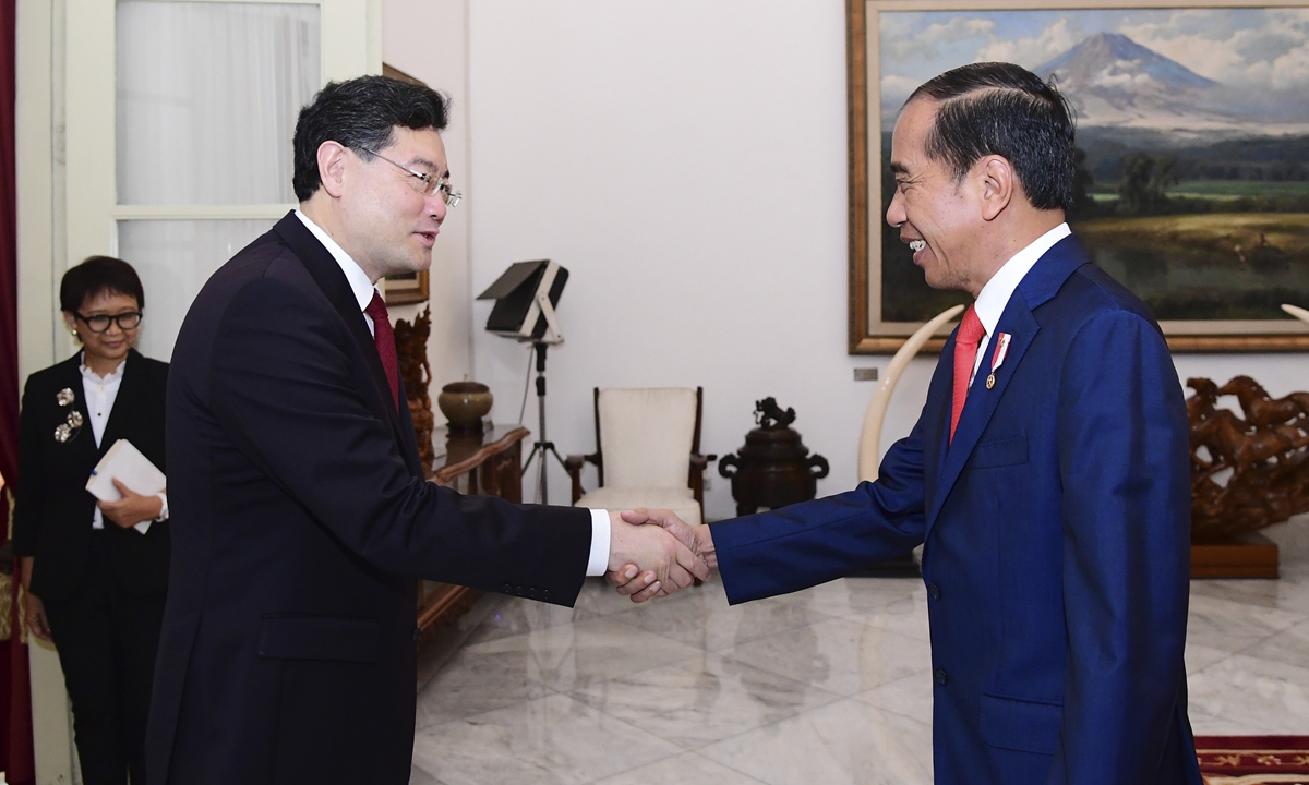 Indonesian President Joko Widodo greets Chinese Foreign Minister Qin Gang during their meeting at Merdeka Palace in Jakarta, Indonesia on February 22, 2023. Photo: VCG